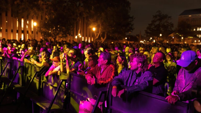 Students and parents enjoy a concert at the annual Trojan Family Weekend event.