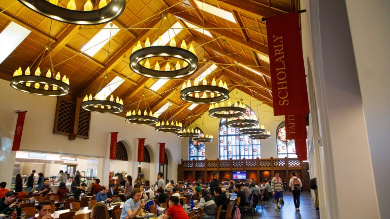 Student eating at USC Village Honors dining hall