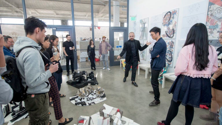 Professor reviewing student's work