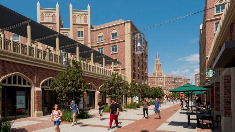 Students walking through USC Village.