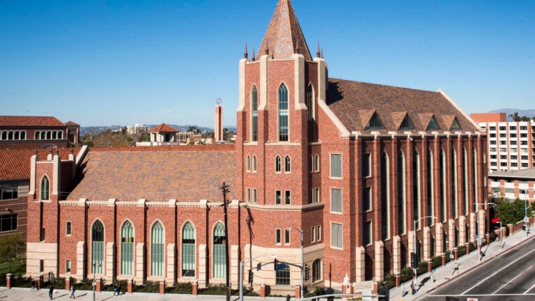 Exterior view of the Jill and Frank Fertitta Hall, with brick and tall windows