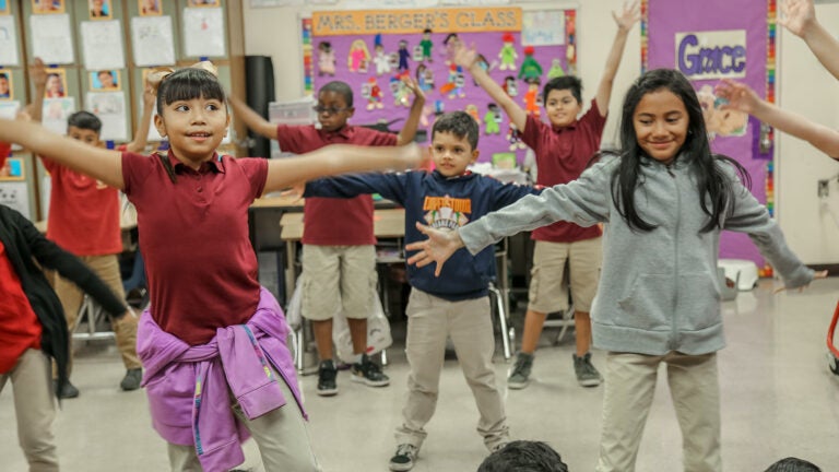Children participating in class activities