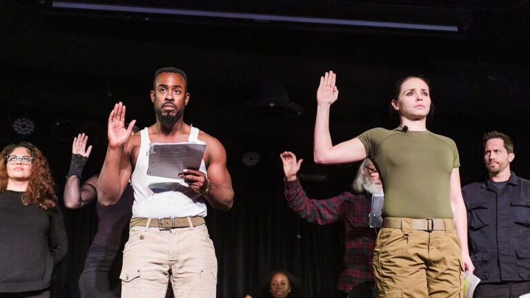 Actors on stage performing