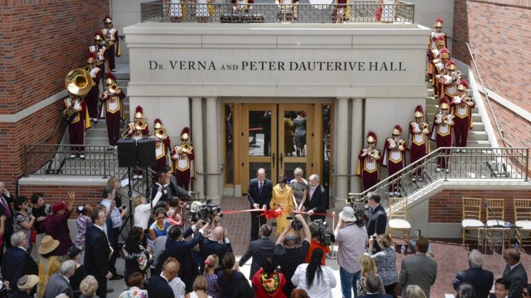 C. L. Max Nikias, Verna Dauterive, Elizabeth Garrett and Leonard Schaeffer officially open the new Dauterive Hall