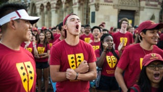 USC students from Parkside Arts & Humanities Residential College stand in a group to participate in the Residential College Spirit Rally.