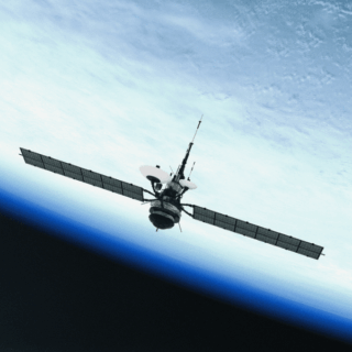 Satellite in space orbiting Earth