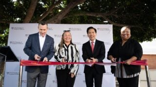 Samuel Garrison , Tosha Bunn-Bell, Beong-Soo Kim and April Smith cut ribbon