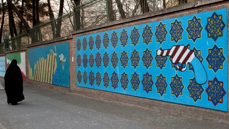 Person outside dormer U.S. embassy in Tehran, Iran